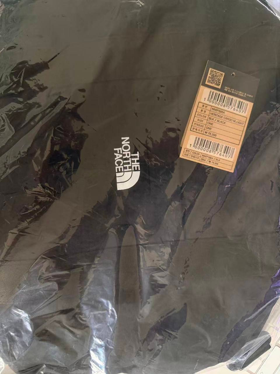 The North Face Korea Heritage Cargo M Light NN2PS05A in black with Korean hangtag