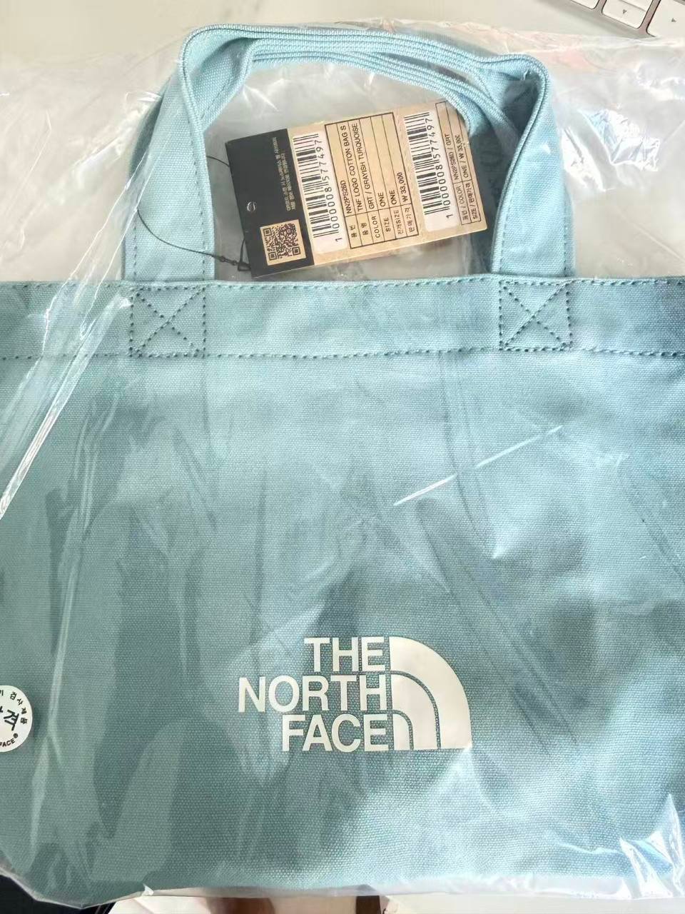 The North Face Korea TNF Logo Cotton Bag S NN2PS26D in grayish turquoise