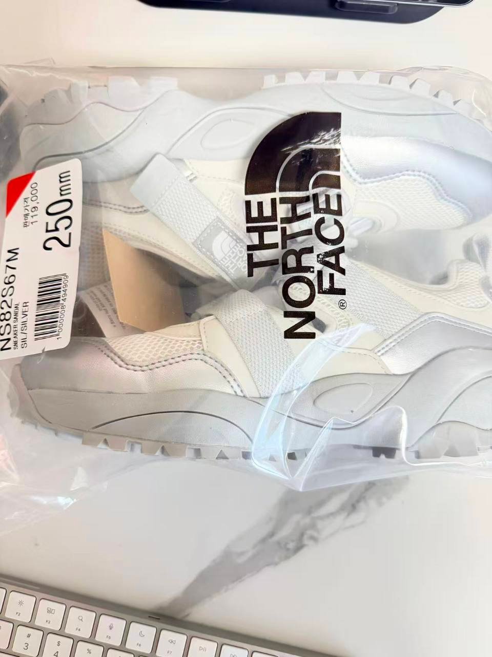 The North Face Korea NS82S67M Sneaker Sandal in silver with 250 mm package label